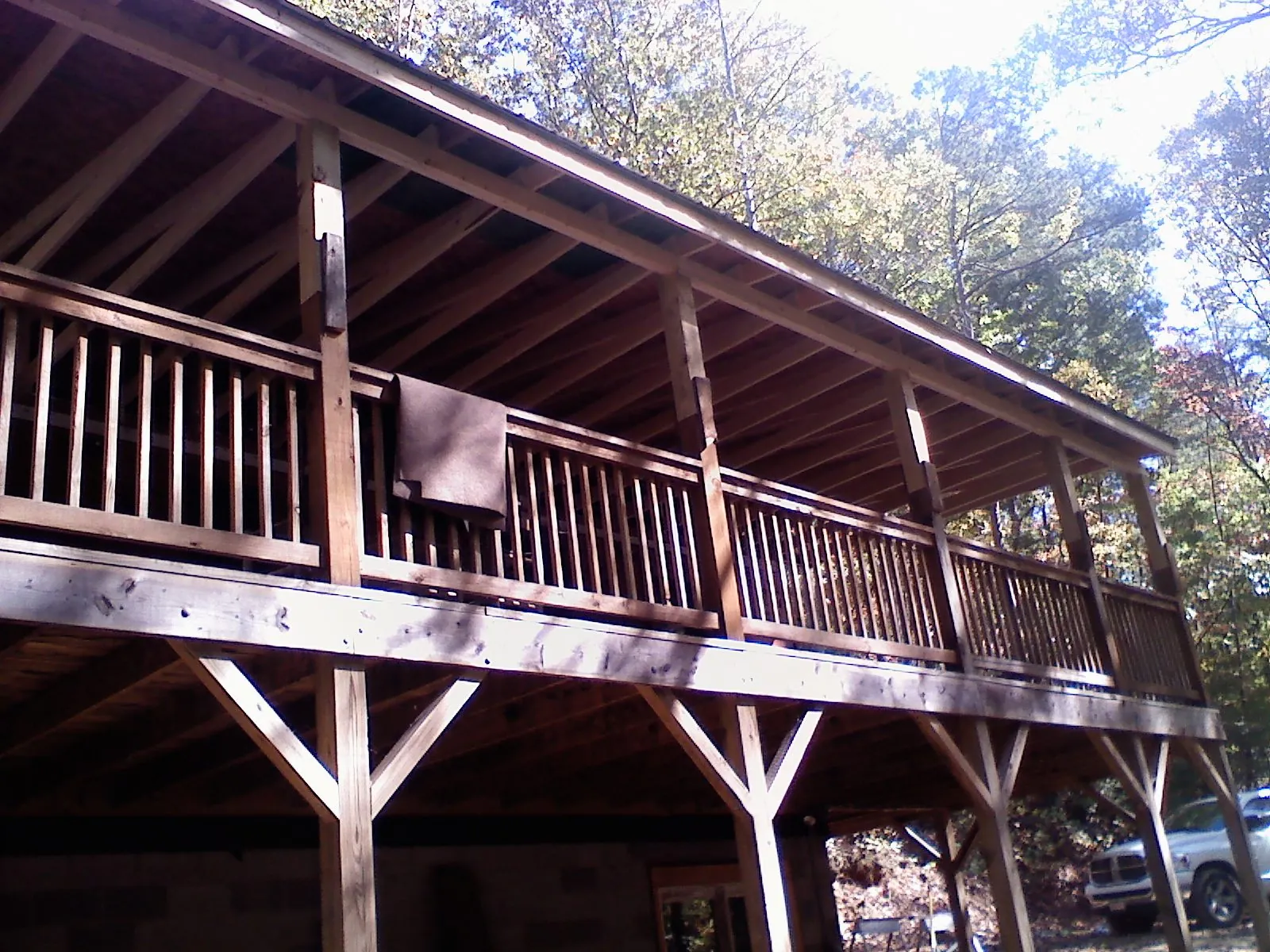 Timber framing under a new elevated porch and deck — Roof Leak Repair in Palo by Roofing Brothers
